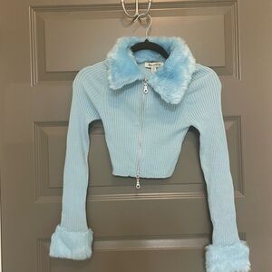 Light blue faux fur zip up cropped sweater